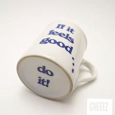 a coffee cup with the words if it feels good do it