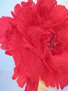 "* This 14\" diameter vibrant red open flower with red netting is spectacular and eye catching. * In between many of the individually wired petals are bunches of soft red tulle netting which gives a sophisticated edge. * From all sides this is a well designed and from the sides and back you can see the red Ostrich feathering. * Upon ordering you will receive this exact fascinator. * Designed on a satin covered acrylic headband it is well balanced, comfortable to wear and will fit just about any Red Handmade Flowers Fascinator For Spring, Red Flower Fascinator For Party, Acrylic Headband, Ladies Luncheon, Open Flower, Flower Headpiece, Soft Red, Easter Rabbit, Costume Hats