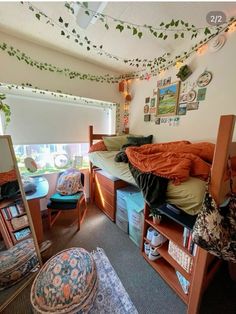 a bedroom with bunk beds and lots of clutter