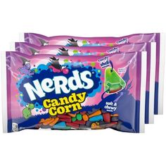 3 bags of nerds candy corn with green and purple candies in them on a white background