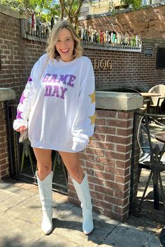 Alright, y'all... we almost can't contain our excitement over these Game Day Custom Vintage Crewnecks! Made exclusively for SYBB, these beauties are here to bring your game day wardrobe up a notch in comfort and cuteness. Distressed throughout and with a worn-in, vintage inspired feel, in colorways perfect for all things LSU, Saints, and Mardi Gras! Paired here with our most-loved Urson Boot. Oversized fit ~ Size up and wear it as a dress! Bonnie wearing size XL Distressed throughout Custom desi Purple And Gold Game Day Outfits, Purple Game Day Outfit, Purple Games, Mardi Gras Outfits, Church Fits, Gameday Couture, Vintage Crewneck, Vintage Couture