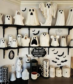 a shelf filled with lots of halloween decorations