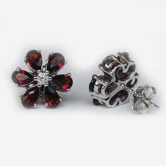 Earrings Details 14k Solid White Gold (Also available in Rose and Yellow Gold, Please select at checkout) 12.5mm High X 12.5mm Wide White Diamonds 0.12 Carats (Total Diamond Weight/ 2 Pcs.) SI-H (White Diamond) Brilliant Cut Surrounding Stone Details Natural Garnet (Center Stone) Pear 5X3mm (Center Stone Dimensions) 3.40 Carats (Average Center Stone Weight/ 12 Pcs.) Earrings can be made in 14, 18K/ White, Yellow and Rose Gold. For custom order this earrings with a different stone, please contact Oval Morganite Ring, Red Garnet Earrings, Dainty Band, Eternity Band Ring, Half Eternity Ring, Garnet Earrings, Morganite Ring, Earrings Red, Red Garnet