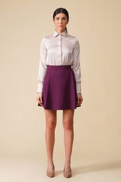 A High waist pleated mini skirt featuring front pleats, a line silhouette, and back concealed zipper closure. - a line silhouette - high waist - above the knee length (mini) - front pleats - two front pockets - color: purple. Fabric: viscose - 40%, elastane - 5%, polyester - 55%. Length - 18" / 45 cm  Our model wears size 2 US / 36 EU and is 176 cm / 5'9" tall. MORE ITEMS: https://www.etsy.com/shop/TAVROVSKA?ref=hdr_shop_menu Skater Dresses Casual, Work Outfits Frauen, Black Pleated Mini Skirt, Preppy Skirt, Purple Skirt, Skirts For Women, Knee Dress, Work Outfits Women, Outfits Women