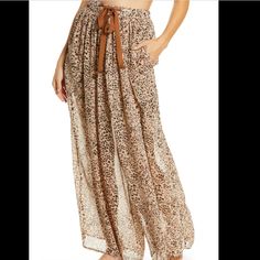 Free People Sleepin’ In Semi Sheer Wide Leg Pants. 2 Pockets. Medium. New With Tags. Loosely Fitted Full-length Beach Bottoms, Casual Summer Bottoms For Beach Season, Chic Beach Bottoms With Loosely Fitted Hips, Summer Beach Season Daywear Bottoms, Summer Bottoms For Beach Season Daywear, Summer Beach Season Bottoms For Daywear, Beachwear Bottoms With Tie Waist For Spring, Spring Beachwear Bottoms With Tie Waist, Relaxed Fit Bottoms With Elastic Waistband And Tie Sides