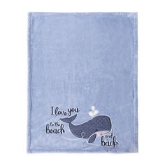 a blue towel with an image of a whale that says i love you to the beach and back