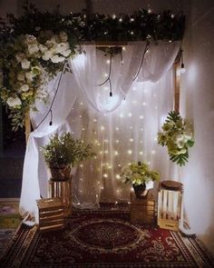 an image of a room decorated with flowers and lights