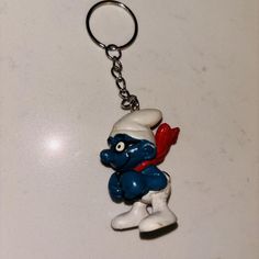 Skiing brainy Smurf keychain, vintage one of a kind 

#keychain #smurf #skiing #thesmurfs Brainy Smurf, Men's Accessories, Skiing, Mens Accessories, Outfit Accessories