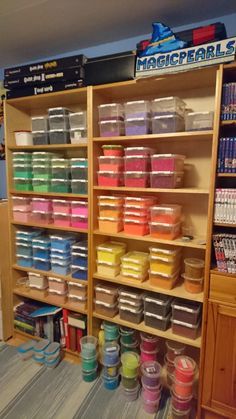 the shelves are filled with many different types of craft supplies