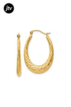 14k yellow gold polished and textured twisted oval hoop earrings. Measure approximately 1 1/4"L x 1/8"W and have wire and clutch closure. Oval Hoop Earrings, Gold Polish, 10k Gold, Hoop Earrings, Twist, Yellow Gold, Texture, Yellow, Gold