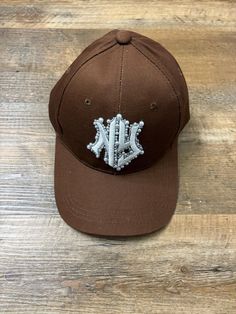 Custom NY Pearl Hat 🤎🤍 Made w/love I don't accept any exchanges or returns but if you have any issues with your order, please message me Thank you so much:). Pearl Hat, Ny Hat, I Thank You, Hat Making, Trucker Cap, Caps Hats, Accessories Hats, Accessory Gift, Electronic Accessories