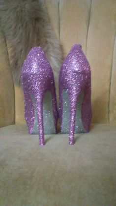 Lavender purple covers the entire top portion of the heels while the underside is covered in an ultra fine sliver glitter. These heels can be made in any color combo desired. If you would like another color combination please leave your color choices at checkout. All of our artwork is sealed with a water resistant sealant that helps to protect the artwork and avoid glitter fallout. This heel is available in additional colors and shoe styles. Contact us today for more color and style options. All Glamorous Purple Heels For Wedding, Glamorous Purple Closed Toe Heels, Glamorous Purple High Heels, Lavender Heels With Pointed Toe For Party, Pink Glitter High Heel Heels, Lavender Round Toe Heels For Party, Lavender Pointed Toe Heels For Party, Purple Glitter High Heels, High High Heels