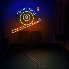 a pool table in front of a neon sign that says, do hit that 8