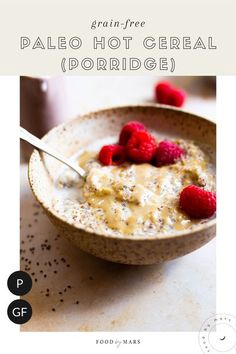 a bowl filled with oatmeal and raspberries