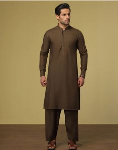 Brand New J.Junaid Jamshed Original Men's Wear Kurta Shalwar Size:Large ColorMehndi Green Pieces2 Piece Fit TypeRegular Fit FabricBlended Due to the photographic lighting & different screen calibrations, the colors of the original product may slightly vary from the picture *No Return Or Exchange** Brown Long Sleeve Traditional Wear For Eid, Brown Cotton Traditional Wear For Eid, Semi-stitched Brown Salwar Kameez For Eid, Unstitched Brown Lawn Suit With Dabka Details, Brown Cotton Kurta With Dabka, Brown Long Sleeve Traditional Wear With Dabka, Traditional Brown Unstitched Suit With Dabka, Brown Lawn Suit For Eid, Brown Kurta For Eid