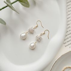 **PM me for any questions, please!  //About This Pair of Earrings// Set with large baroque style freshwater genuine pearls. Every piece is so lustrous and slightly different in shape, making each of them unique in its own beauty. It's your perfect wedding jewelry/earrings to make a statement but also versatile enough for any other important moments in life. Super elegant, minimalist and timeless option.  Gemstone: 11mm baroque freshwater genuine pearls Closure: 14K gold vermeil (gold on silver) post Pearl Size: 10-15mm*9.5mm SPECIAL NOTE 1. All baroque series use natural freshwater pearls which come in irregular shapes. Every pair comes with unique shapes of pearls. 2. Eearrring sticks use high-quality 925 sterling silver to prevent allergy. Thus it's expected that the stick is very soft a Natural Pearl Earrings, Bridesmaid Pearls, Style Baroque, Pearl Dangle Earrings, Wedding Jewelry Earrings, Baroque Fashion, Pearl Earrings Dangle, Baroque Pearls, Natural Pearls