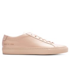 Taking on a contemporary aesthetic, the Common Projects Original Achilles Low makes an impression with its premium design. The design takes on a complete leather upper as well as a leather lining for added comfort. The gold-tone branding paired with the rubber outsole finishes up the remainder of the sneaker. Leather upper Leather lining Lace-up front Gold-tone branding Rubber outsole All sizes are listed in European Men’s sizing unless stated otherwise Style No: 1528-1996 Classic Low-top Sneakers With Leather Trim, Low-top Leather Sneakers With Steel Toe, Leather Low-top Sneakers With Logo Patch, Low-top Leather Sneakers With Contrast Stitching, Common Projects Achilles Low, European Men, Common Projects, Luxury Sneakers, Contemporary Aesthetic