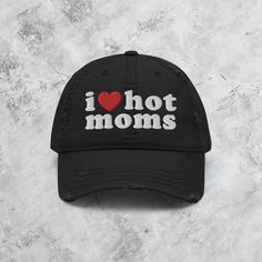 You love hot moms? We do too. Expand your headwear collection with this fashionable dad hat. With a slightly distressed brim and crown fabric, it'll add just the right amount of edge to your look. For a quick and easy outfit pair it with slacks, your favorite jeans, and a sports tee. * 100% pre-shrunk cotton twill * Soft crown * 6 sewn eyelets * 6 stitched rows on the brim * 6-panel unstructured cap with a low profile * Seamed front panel without buckram * Adjustable hook and loop closure Trendy Distressed Dad Hat, Trendy Distressed Adjustable Dad Hat, Trendy Letter Print Dad Hat, Trendy Distressed Dad Hat With Curved Brim, Casual Black Dad Hat As Gift, Trendy Curved Brim Distressed Dad Hat, Personalized Casual Dad Hat For Gift, Trendy Adjustable Dad Hat With Letter Print, Casual Hats With Letter Print For Gifts