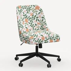 an office chair with flowers on the back and wheels, in front of a white background