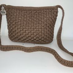 Gorgeous Crocheted Crossbody Bag By The Sak. New Condition- Tags Were Removed But Bag Was Never Used. Beautiful Taupe Color. One Exterior Zipper Pocket; Interior Zipper Pocket, Cell Phone Pocket And 2 Bonus Pockets. Zipper Closure. Measurements Are 8” High By 10” Wide. This Bag Is A Must Have And Will Be Your Go To Bag For All Of Your Outfits! Daily Use Crochet Crossbody Bag, Adjustable Strap Crochet Crossbody Bag, Crochet Crossbody Bag With Adjustable Strap, Chic Crochet Crossbody Mobile Phone Bag, Brown Crochet Shoulder Bag For On-the-go, Brown Crochet Mobile Phone Bag, The Sak, Taupe Color, Crochet Bag