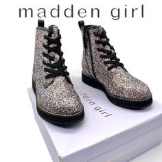 Nib Madden Girl Tory Multi-Glitter Combat Boot, 4. New Condition In Box. Out Of Stock Online. Bring Back That Classic 90s Trend In These Multi Glitter Lace Up Boots Complete With A Chunky Heel And A Durable Tpr Outsole. This Fun Style Features A Memory Foam Sock For Comfort Along With A Pull Tab And Side Zipper To Ensure She Has No Problems Putting Them On. + Color: Black, Silver, Multi-Color Glitter + Style: Jtory Multiglitter Combat Boot + Other Details: Multi-Color Glitter Military/Combat Boo Black Faux Leather Combat Boots With Zipper, Black Glitter Combat Boots, Winter Lace-up Combat Boots With Zipper Closure, Glitter Combat Boots, Kids Combat Boots, Black Combat Boots With Flat Heel, Medium Width, Madden Girl Boots, Girls Black Boots, White Combat Boots