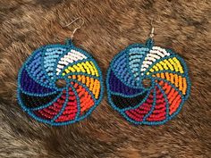 Authentic Beautiful Navajo Handcrafted Pow Wow Fancy Dancer Hand Beaded Wheel Earrings Handcrafted by Navajo Artist R. Sellers Perfect for a Gift❤️ Southwestern Style Beaded Earrings For Festival, Southwestern Multicolor Beaded Earrings, Bead Weaving Patterns, Pow Wow, Beaded Earrings Patterns, Earring Patterns, Hand Beading, Bead Weaving, Indian Jewelry