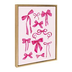 pink bows and ribbons on a white background framed canvas print wall art by artist linda grisby