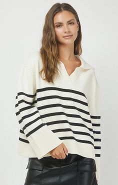 Voda Color: Cream/Black 60% Cotton, 40% Polyester Hand Wash Get cozy and stylish with the Colder Weather Sweater. This oversized striped sweater will keep you warm with its long sleeves. The ribbed V neck adds a stylish touch, while the wide sleeves and ribbed cuffs provide a comfortable fit. Perfect for colder days! White Dress Accessories, Collar Jumper, Oversized Striped Sweater, Swimwear Cover Ups, Swimwear Cover, Going Out Dresses, Shop Maxi Dresses, Wide Sleeves, New Tops