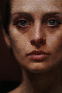 an oil painting of a woman's face