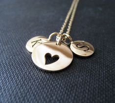 *golden bronze initial charm-8mm in diameter *golden bronze cutout heart charm-12mm in diameter *14k gold filled fine chain-16'' with 2'' extender. * please indicate two initials at checkout All personized jewelry can be found here~ https://www.etsy.com/shop/NYmetals?section_id=7372267 To go back to NYMETALS https://www.etsy.com/shop/NYmetals Valentines Gifts For Mom, Personalized Mom Gifts, Mom Gifts Birthday, Mom Christmas Gifts, Mother Necklace Personalized, Mother Necklace, Valentine Gifts For Mom, Personalized Gifts For Mom, Mom Christmas