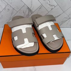 Hermes Cryprus Size 39.5 New With Dust Bag And Box Oasis Shoes, Hermes Oran Sandals, Nigerian Men Fashion, Wooden Sandals, Suede Slides, Heeled Mules Sandals, Rubber Sandals, Hermes Shoes, Hermes Men