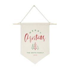 a christmas banner hanging on a wall