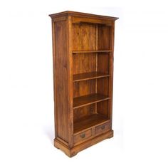 a tall wooden bookcase with two drawers