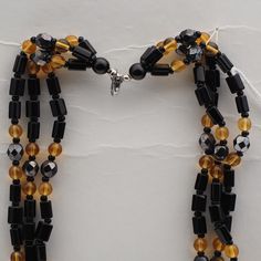 Vintage Czech 3 strand necklace hematite black golden yellow glass beads Yellow Multi-strand Polished Beads Jewelry, Yellow Multi-strand Jewelry With Polished Beads, Golden Yellow, Strand Necklace, Glass Beads, Beads, Yellow, Glass, Black