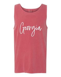 Warmer weather is here!! Throw on this cozy tank weather you're lounging at home, by the pool, or at the beach- this is sure to be any Georgia Bulldog's go-to shirt and coverup! I can do other schools/colors upon request!! COMFORT COLORS Crimson Model: C9360 Cotton: 100% Weight: 6.1 oz Sizes: XS, S, M, L, XL, 2XL, 3XL, 4XL See Similar Products Features Self-bound neck and armhole trim 6.1 oz. Double-needle stitched bottom hem Preshrunk, soft-washed, garment-dyed fabric 100% ringspun cotton Pair with a great insulated can holder https://etsy.me/2r48gD2 Follow us on Instagram @OakandMossClothing Post a photo of yourself in one of our items and tag us to be featured! HOW SOON WILL I HAVE IT?: Each shirt is made to order, and printed by hand. We need 4-6 business days to print and ship your or Cotton Tank Top With Letter Print For Beach Season, Cotton Tank Top For Beach Season Loungewear, Casual Tank Top For Beach Season And Loungewear, Casual Tank Top For Beach Season Loungewear, Moss Clothing, University Of Mississippi, Ole Miss, Georgia Bulldogs, Beach Covers