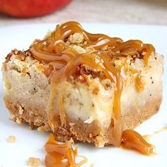 a piece of cheesecake with caramel drizzled on top