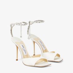 Saeda Sandal 100 | Ivory Satin Sandals with Crystal Embellishment | JIMMY CHOO Jimmy Choo Saeda, Jimmy Choo Bridal, Islam Marriage, Designer Wedding Shoes, Wedding Shoes Bride, Jimmy Choo Heels, Sandals White, Wedding Dress Shoes