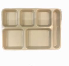 an empty plastic tray with four compartments