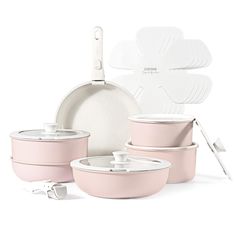 a set of pink pots and pans with utensils next to them on a white background