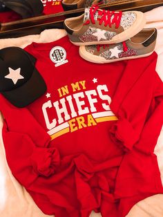 Get ready for game day in style with our In My Chiefs Era sweatshirt! Made from soft and comfy materials, this sweatshirt is perfect for any football fan. Whether you're watching the Super Bowl or just looking for a cute and stylish way to show off your love for the Chiefs, this sweatshirt has got you covered. Get NFL ready with our Chiefs Era sweatshirt! Unisex sizing and fit SPECIAL CARE - WASHING INSTRUCTIONS: Hand washing and air drying are always best for these items. Wash on delicate, cold Collegiate Fleece Tops For Game Day, Varsity Fleece Top For Fan Gear, Baseball Season Fan Gear Sweatshirt, Baseball Season Fan Apparel Sweatshirt, Game Day Sports Fan Fleece Hoodie, Sports Fan Fleece Hoodie For Game Day, Team-colored Fleece Top For Game Day, Sports Season Fleece Sweatshirt, Fleece Sweatshirt For Sports Season Fan Gear