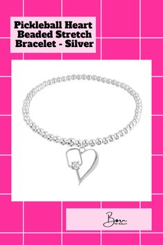 Love pickleball and want to wear your passion? This gorgeous Pickleball Heart Beaded Stretch Bracelet - Silver is the perfect way to do it! An adorable accessory that every pickleball fanatic will adore. Priced at $34.99, it's an affordable addition to your jewelry collection and an ideal gift for the pickleball lover in your life!#Borntorally #jewelry #Pickleballbracelet #Pickleball #bracelet #braceletforgirls Pickleball Bracelet, Pickleball Jewelry, Sport Accessories, Ball Bracelet, Unique Bracelets, Affordable Gifts, Sports Accessories, Beaded Stretch Bracelet, Heart Beads