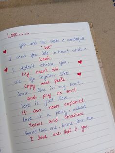 an open notebook with writing on it