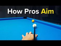 a person is playing pool with the words how pros aim