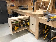 a workbench with lots of tools in it