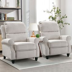 two recliners sitting next to each other in a living room