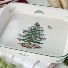 a green and white tray with a christmas tree on it