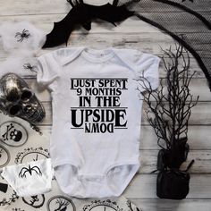 This adorable graphic Onesie® for the “Stranger Things” enthusiast, this is a very popular item for babies. This is one of my "Best Sellers" and is a great baby shower or new baby gift. Graphic has 9 months saying on front and Mind Flayer on back bottom as shown. These can be customized in your choice of vinyl color as shown. Garments come only in Black, Gray & White. Onesies® come in a variety of sizes of your choice. We use high quality, soft flex vinyl which not only creates a sharp, vivid gr Halloween Baby Onesies, Fitted Halloween Onesie, Halloween Onesie Boy, Horror Onesies, Graphic Onesies, Country Baby Shower, Mind Flayer, Fun Baby Announcement