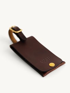 Our handmade leather Luggage Tag is the perfect travel companion. Built to allow quick and secure identification, while making your luggage stand out at the airport carousel.An enclosed ID tag provides protection from the elements and prying eyes while allowing for proper identification in the event of baggage loss.Premium Horween full-grain leather, solid-brass hardware and robust stitching for many years of service, guaranteed. Customize your handmade Luggage Tag with a complimentary monogram Classic Brown Travel Accessories For On-the-go, Classic Leather Travel Accessories As Gift, Classic Leather Travel Accessories For Gifts, Leather Luggage Tag With Luggage Sleeve For Gift, Leather Luggage Tag With Sleeve For Gift, Leather Luggage Tag With Sleeve As A Gift, Classic Brown Leather Luggage Tag, Brown Leather Luggage Tag With Leather Patch, Brown Leather Luggage Tag With Patch