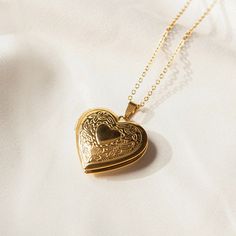 Available in Gold?
Necklace Length: 19.5''
Openable
18k Gold Plated on Premium Stainless Steel
Delivered in Zinfu Fine Jewelry Package.
Instruction of How to place a photo in it. Vintage Gold Heart Locket, Locket Aesthetic, Love Locket, Jewelry Package, Customised Bracelets, Silver Locket Necklace, Gold Heart Locket, Gold Locket Necklace, Stacked Necklaces