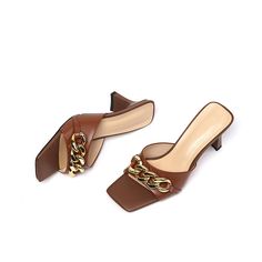 Elegant and stylish mules that offer you an effortless chic look. Upper: Genuine Leather Lining: Genuine Leather Outsole: Rubber Toe Shape: Open Toe Heel: 6.5cm/2.5'' Closure: Slip on is_handmade: Yes Chic Chain Sandals For Spring, Brown Open Toe Sandals With Chain Strap, Trendy Summer Heels With Chain, Chic Sandals With Chain Strap And Round Toe, Summer Open Toe Heels With Gold Chain, Trendy Summer Heels With Gold Chain, Brown Summer Mules For The Office, Brown Summer Mules For Office, Trendy Leather Heels With Chain Strap